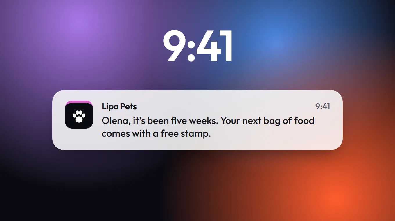 Phone lock screen with a message from Lipa Pets: Olena, it has been five weeks. Your next bag of food comes with a free stamp.